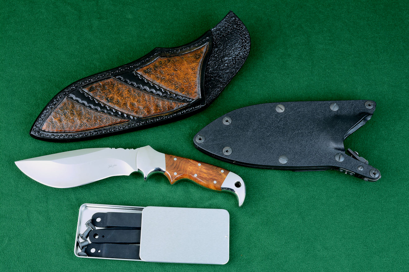 "Hooded Warrior" complete package, with two sheaths, one leather, one locking in stainless steel and anodized aluminum with kydex, extra wear gear, belt loops clamps, container "Hooded Warrior" complete package, with two sheaths, one leather, one locking in stainless steel and anodized aluminum with kydex, extra wear gear, belt loops clamps, container